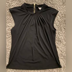 Black sleeveless blouse in excellent condition